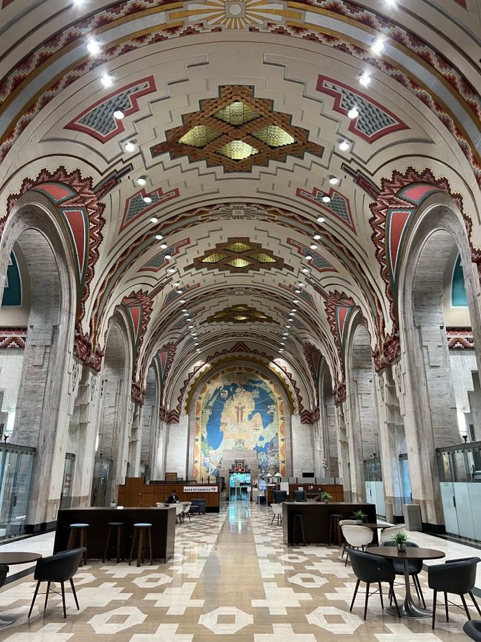 A breathtaking view of the Guardian Building's intricately designed interior, showcasing vibrant colors and architecture.